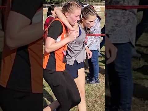 Arkansas high school runner helps competitor cross the finish line