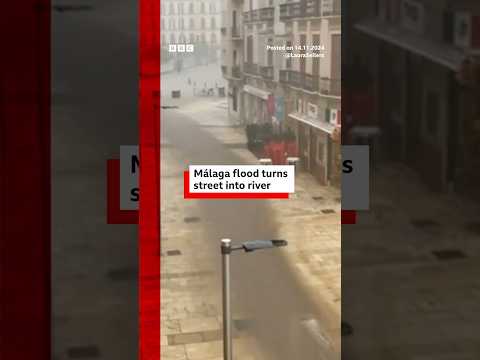 Málaga flood turns street into river after Spain torrential rain. #Spain #BBCNews