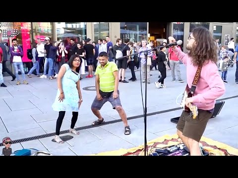 Funny couple dancing with Street Performer in Frankfurt, Germany