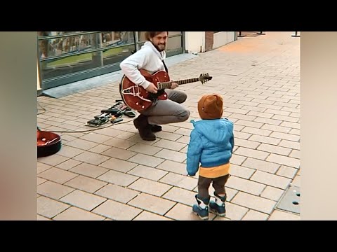 This Kid is Feeling the Music! Dancing with Street Performer