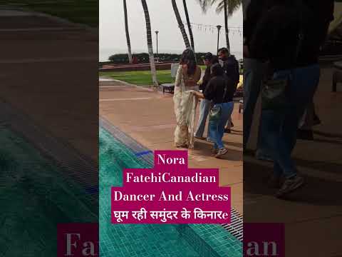 Nora FatehiCanadian Dancer And Actress घूम रही समुंदर के किनारे#youtubeshorts #trendingshorts#shorts