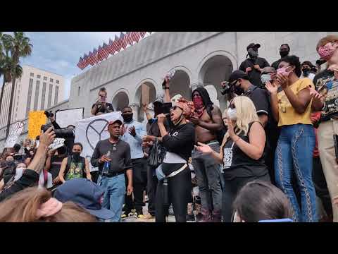 Peaceful Protestors singing "This Little Light of Mine"