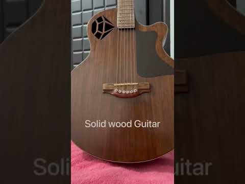 #solidwoodguitar #orignalsound #newcoceptshape