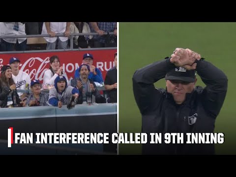 Fan interference ruled as Dodgers fan reaches over the wall for Gleyber Torres hit | ESPN MLB