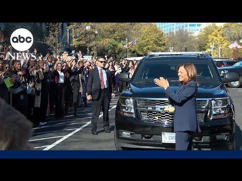 Kamala Harris cheered on by staff as she arrives back at the White House