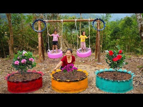 The mother teaches her child to make swings and flower pots from discarded tires | Hoang Huong