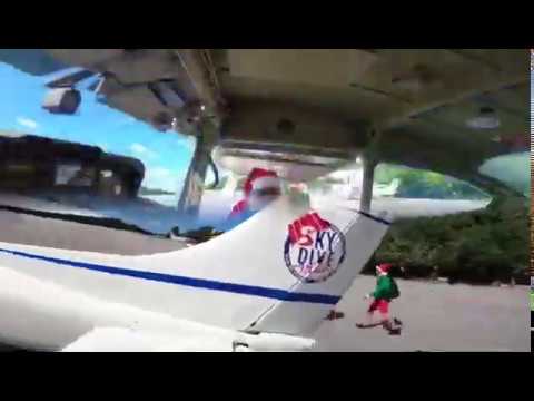 Skydiving Santas over Playa del Carmen... MUST SEE!!