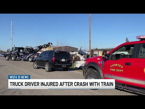 Truck driver injured after crash with train in Macon County