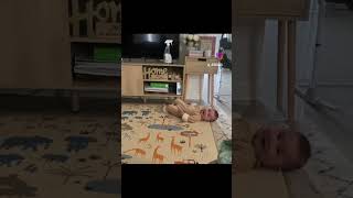 Rolling from tummy to back! #BabyMilestone # happyBaby #shorts #tiktok #CuteBaby #SmilingBaby #funny