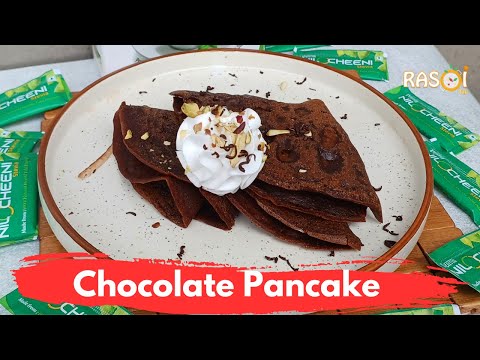 Chocolate Pancakes with Whipped Cream and Nuts