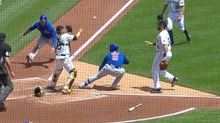 WHAT??? Javy Báez starts pickle running to 1st, gets a run scored, somehow gets to 2nd!