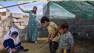 A Roof of Plastic: Shielding Her Goats from the Cold