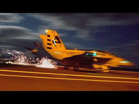 Sparks Fly All Over As Aircraft Carrier Launches/Recovers F-18s With Electromagnetic Systems