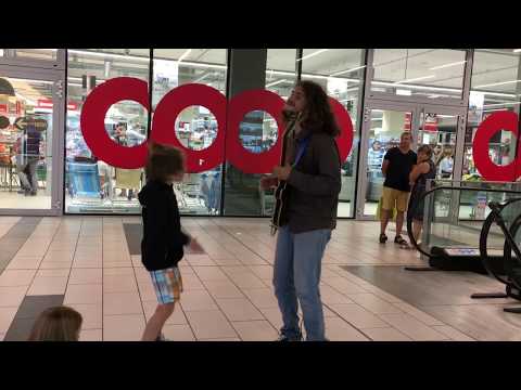 Kid playing Air Drums with Street Performer - 'Cocaine'