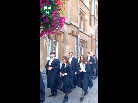 Oxford University students celebrate their graduation at Jesus College