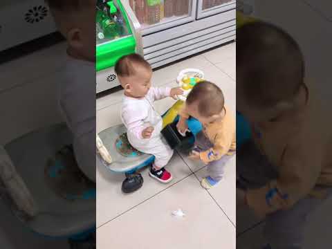 Cute 🥰 Baby is givening gift to his brother #cute #baby #babies #fun #foryou #babyboy #babygirl