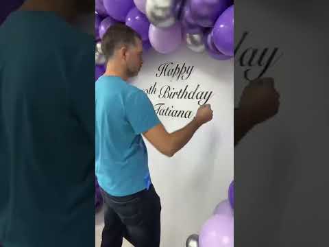 Purple balloon arch | round backdrop with balloon arch