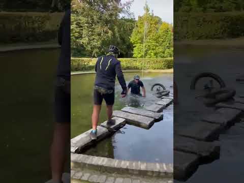 Bicyclist Falls Into Fish Pond