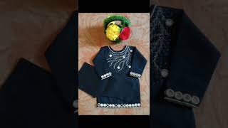 Check out this amazing black baby girl dress with mirror work embroidery!@FashionbyFarrukh