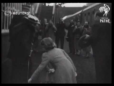 Little Princesses with Duchess of York on holiday/Royal party arrive at 5am in Scottish mist (1936)