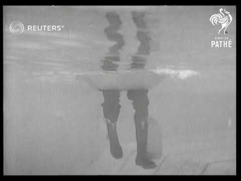 THIS BOAT HAS LEGS It's just ducky for hunting. Inventor at Sunset Beach tests 'waddle-cra...(1932)