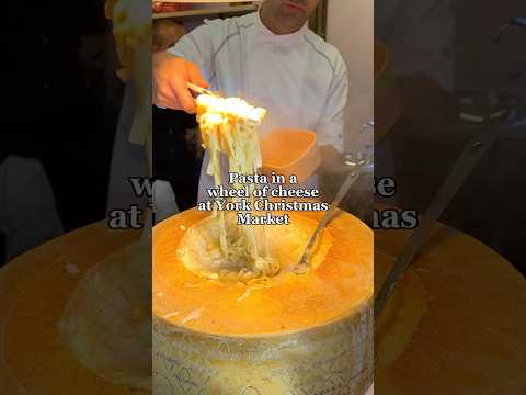 Pasta in a wheel of cheese at York Christmas Market #shorts #food #york #christmas