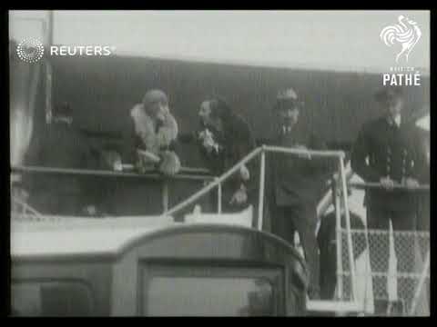 Couple wave from honeymoon yacht 'Cutty Sark' (1930)