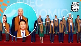 Lame-duck Biden humiliated with back-corner spot in APEC family photo