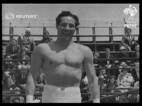 SPORTS: BOXING: Max Baer now champ . Carnera deposed. Final training pictures of US fighte...(1934)