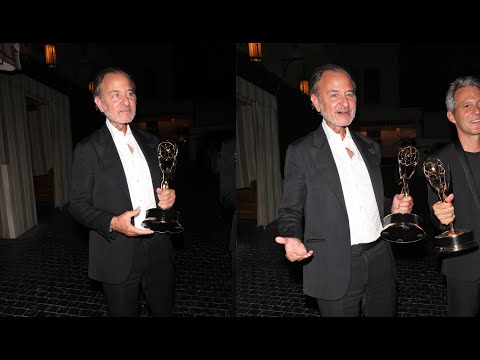 Actor And Director Fisher Stevens Holds An Emmy Wward As He Exits The Chateau Marmont Hotel in LA!