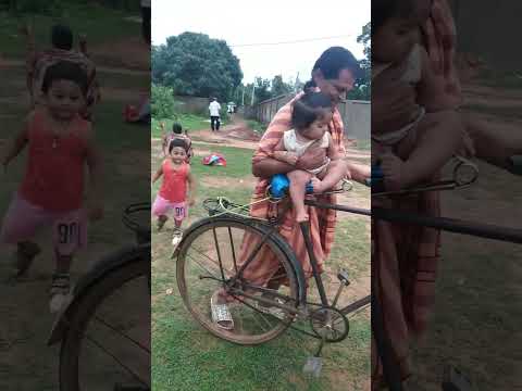 cute baby cycle riding with grand pa #cutebaby #babymoments #babycelebration #adorablebabymoments