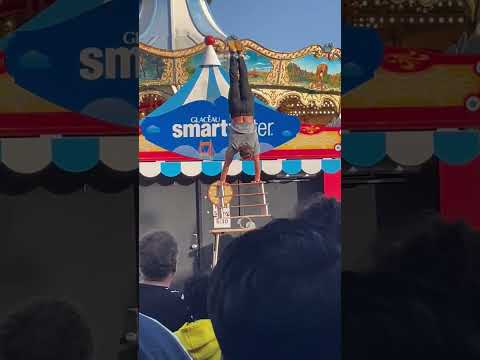 Circus acrobat street performer Orion Griffiths , San Francisco Pier California July 2024