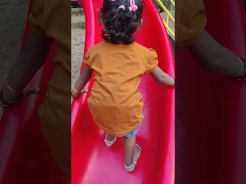 Junia climbing the slider in reverse| time flies | 2 years toddler #babygirl #toddler #2yearsold