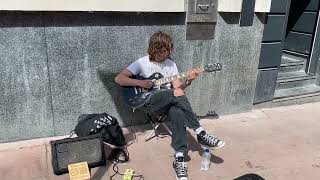 Such a great sound! Very talented young guitarist Henry L Fuller busking!