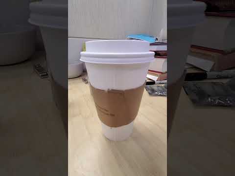 Ten second video of a lukewarm cup of chai tea with soy milk and artificial creamer