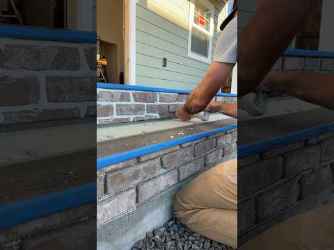 Grouting the Brick on the Tiny Home