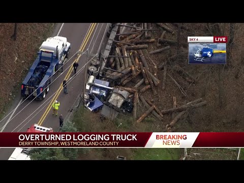 Logging truck overturns, dumps load down hillside in Westmoreland County