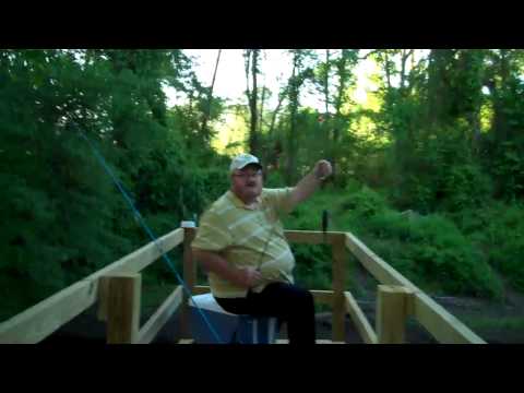 Ricky Catches a fish on our pier in Old Sparta