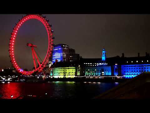 Lights Display On London eye And The Parliament Building