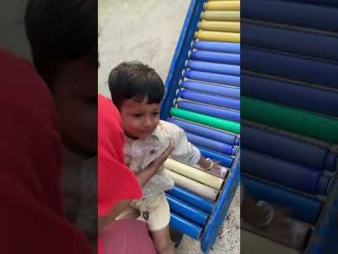 Ishan Playing on Slide