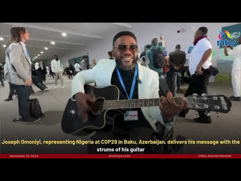 Joseph Omoniyi, representing Nigeria at COP29 delivers his message with the strums of his guitar