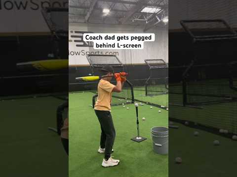 Coach dad gets pegged behind L-screen during batting practice