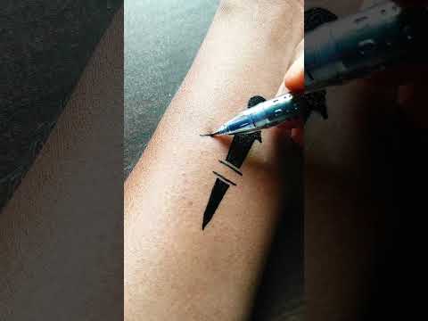 Wow 😱😱 Letter G with Sword ⚔️tattoo idea on wrist ..... #art #tattoo #temporarytattoo #asmr