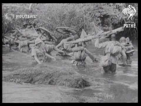 Sierra Leonean troops manning cannon of the British West African Field Corps during field ...(1942)