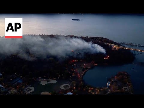 Wildfire burns on northern tip of Manhattan, New York