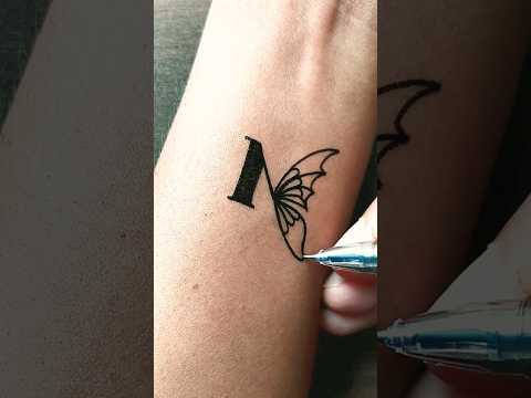 DIY tattoo M & butterfly 🦋.....#tattoo #viral #trending #art #love