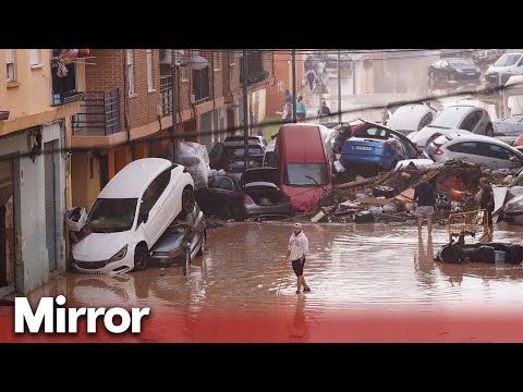 Search for bodies after flooding claims at least 95 lives in Spain