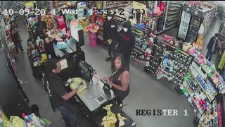 Surveillance video shows suspects accused of robbing Dollar General, shooting off-duty guard