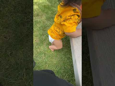 baby does not like the grass