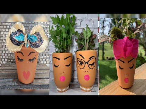 painted pots of female face planters ideas